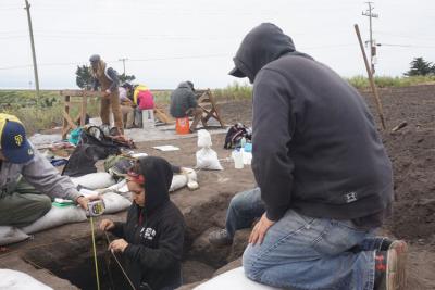 Santa Cruz excavation with Amah Mutsun tribal members Vanessa Sanchez and Lupe Delgado, and UCB grad student Gabriel Sanchez