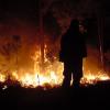 Firefighter watching for embers, National Park Service image